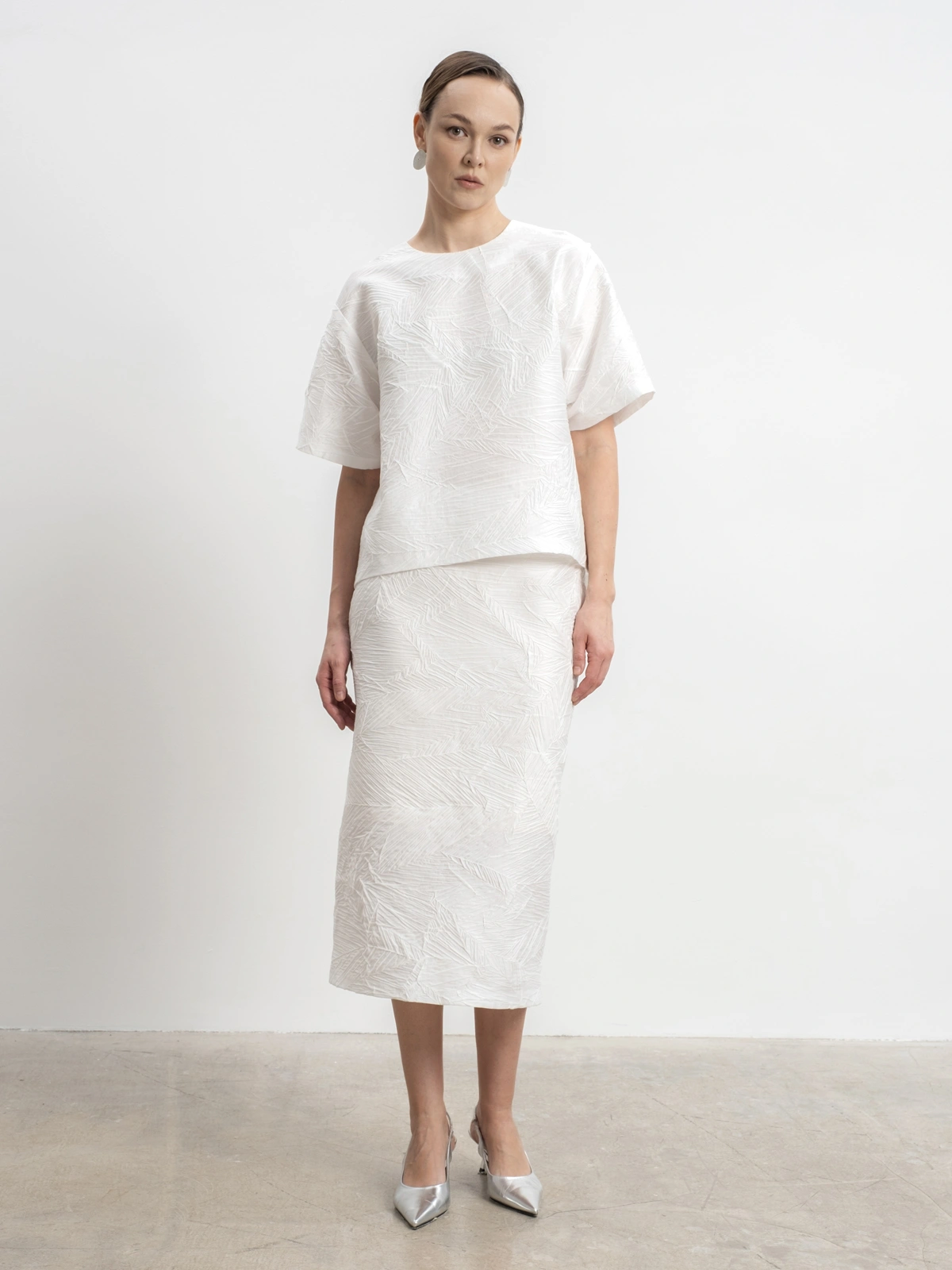 Белая юбка из жатой ткани