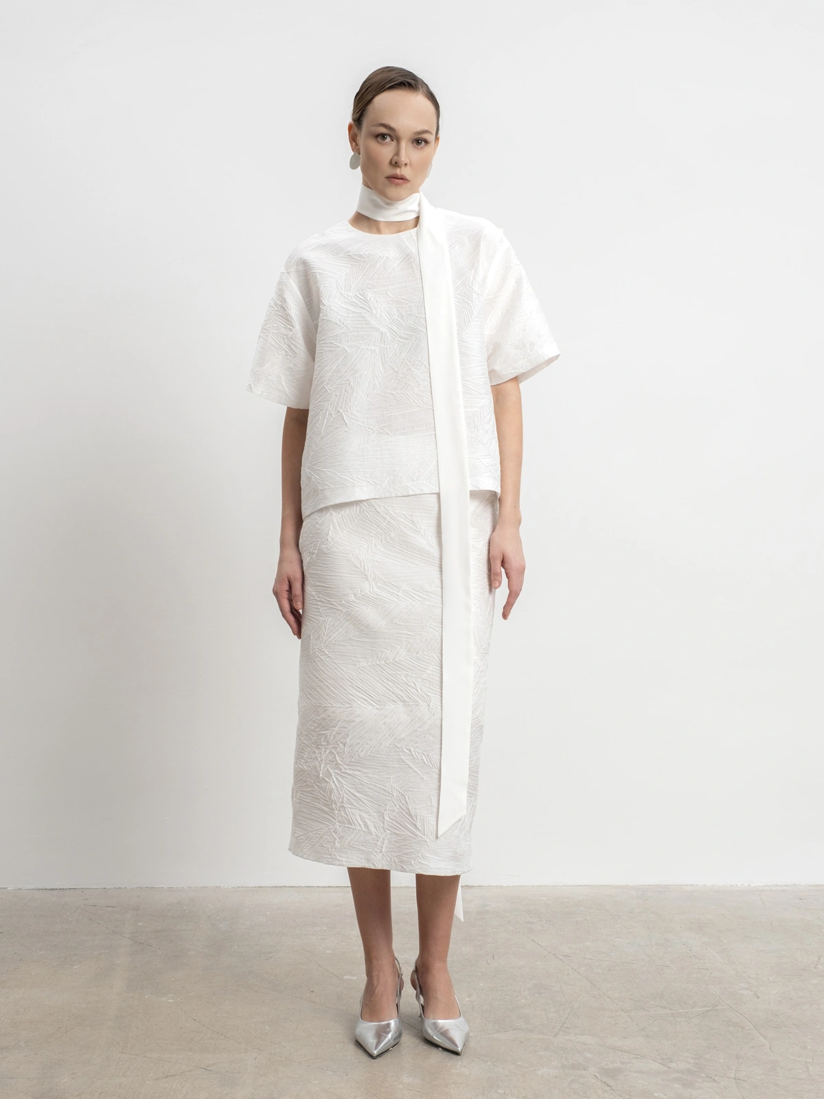 Белая юбка из жатой ткани