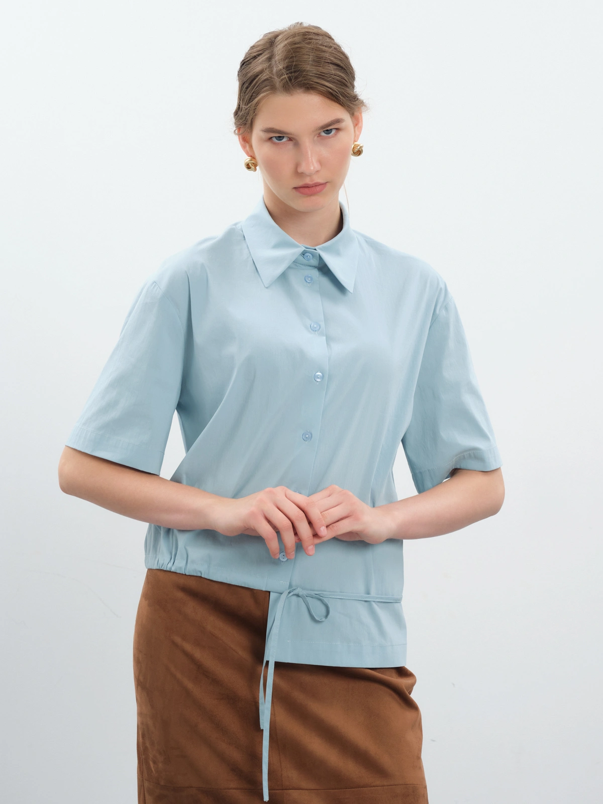 Голубая блуза с асимметричным низом